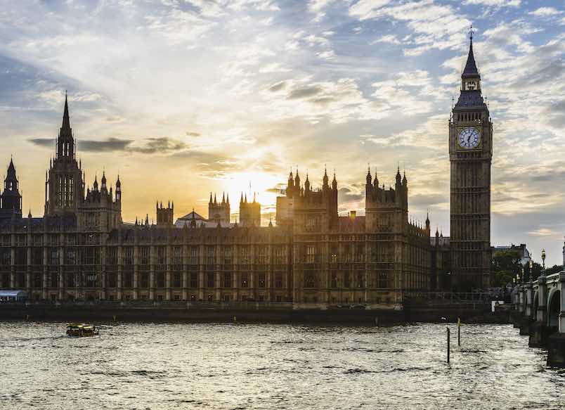London, London, United Kingdom,Sun setting over Houses of Parliament, London, United Kingdom