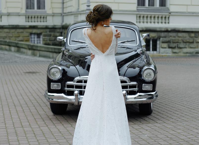 wedding couple with wedding car